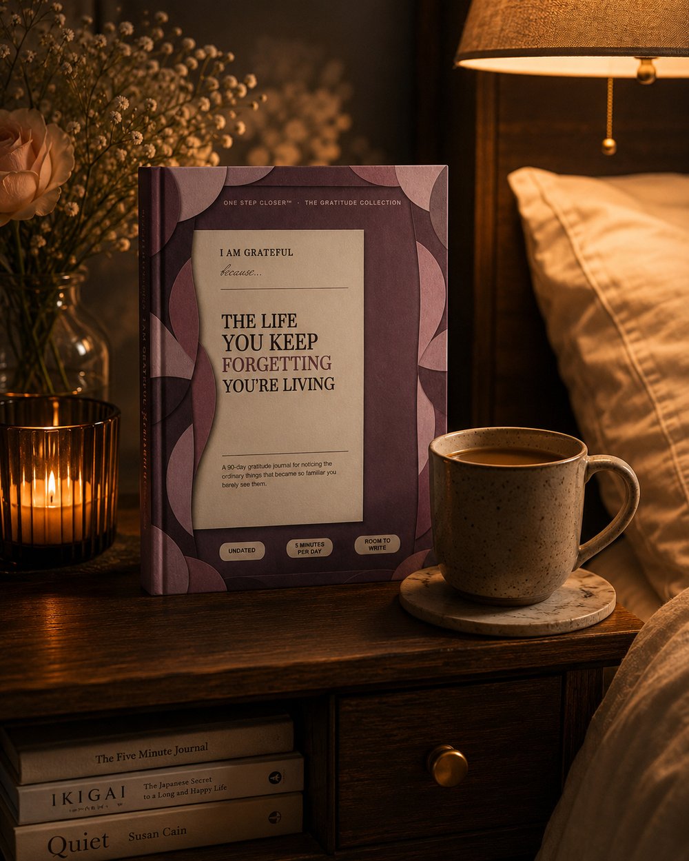 The Life You Keep Forgetting You're Living journal on a nightstand