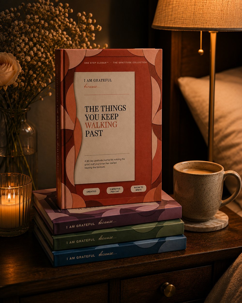 The Things You Keep Walking Past journal on a nightstand